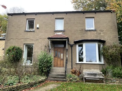 A stone detached house in Wakefield